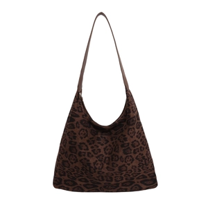 Sac fourre-tout vintage à imprimé léopard en daim marron avec anse en cuir chic