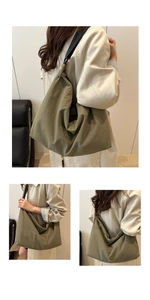 Detail of army green nylon hobo bag with adjustable strap and casual slouchy texture