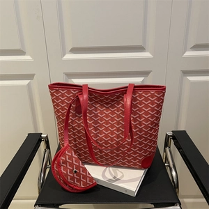 Large red printed tote bag set with matching pouch and signature geometric pattern