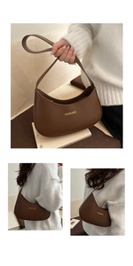 Detail of dark brown crescent bag with gold Fashion & Bags lettering on smooth leather