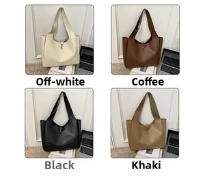 Detail of four chic tote bags in beige, coffee, black, and khaki with elegant metal buckle