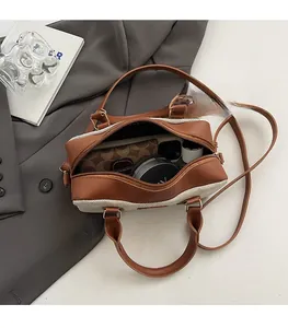 Top view showing the spacious interior capacity of the canvas and leather bowling bag