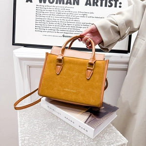 Minimalist mustard yellow crossbody bag with fashion bags text and retro texture design