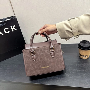 Deep purple minimalist square handbag with top handle and Fashion Bags lettering