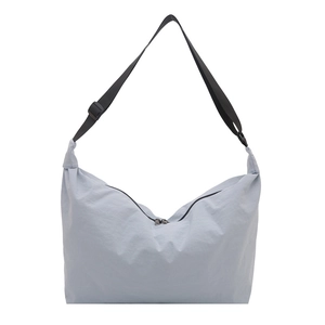 Minimalist light blue-grey waterproof nylon hobo bag with adjustable wide shoulder strap
