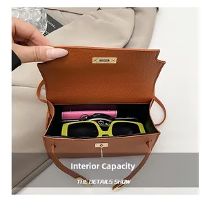 Internal view of brown pebble leather tote bag showing spacious capacity for daily items