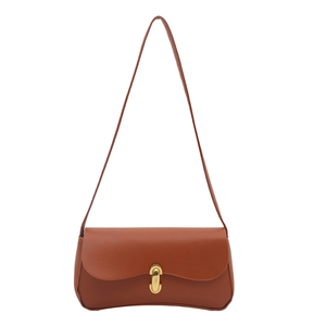 Minimalist brown leather shoulder bag with gold metal clasp and adjustable strap