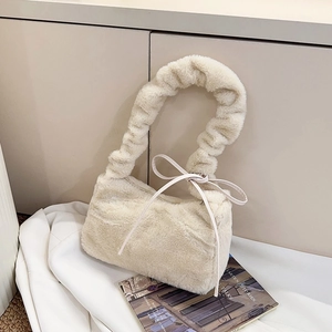 Chic off-white faux fur plush shoulder bag with ruffled handle and bow detail