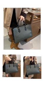 Detail of the repeat M-letter monogram print and high-quality gold hardware on the tote