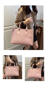 Detail of pink tote bag with M letter prints and sturdy handles for work commute
