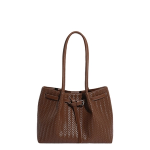 Dark brown woven tote bag with V-pattern texture and long shoulder straps for women