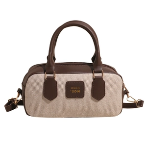 Retro canvas and brown leather boston handbag with gold hardware and shoulder strap