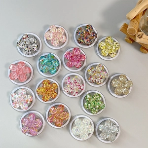 Magnetic flower phone socket grip with glitter cherry blossom design in multiple colors