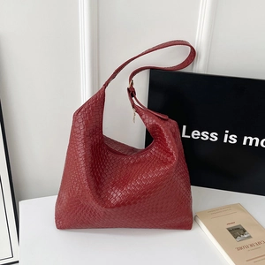 Large dark red woven leather hobo tote bag with adjustable shoulder strap for women
