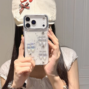 Detail of glitter iPhone case with 3D iridescent beads and silver star metal rivets
