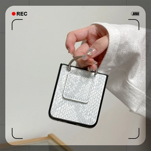 Silver snakeskin leather case for Samsung Z Flip 6 with a round metal ring handle