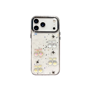 Clear iPhone case with glitter finish featuring 3D iridescent cherries and silver stars