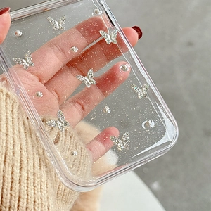 Custodia iPhone trasparente glitterata con farfalle 3D in cristallo e perline argento