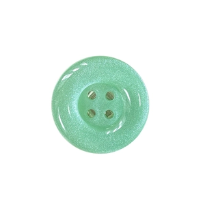 Minimalist mint green glittery button-style phone grip stand on a white background.