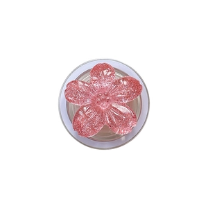 Pink sequin cherry blossom magnetic phone socket stand with glitter details on white base