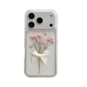 Transparent iPhone case featuring real pink dried flowers, sequins, and a silk bowknot