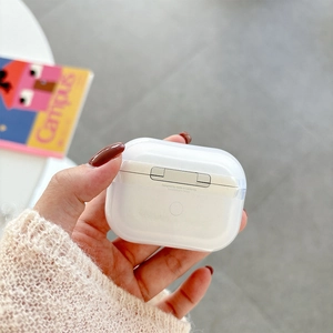 Close-up of translucent white AirPods Pro case with split-structure and pairing button view