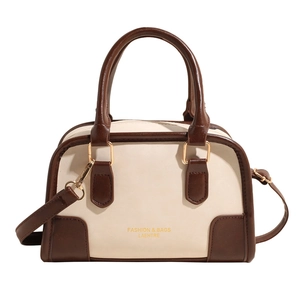 Retro cream and brown Boston handbag with top handles and adjustable shoulder strap