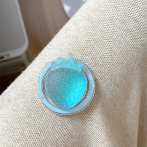 Macro shot of 3D strawberry phone grip featuring translucent gradient resin and seeds