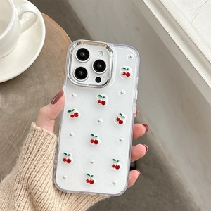 Detail of iPhone case with 3D cherry accents, pearls, and glitter finish