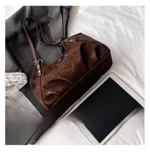 Detail showing vintage textured dark coffee tote bag with stylish pleated design details