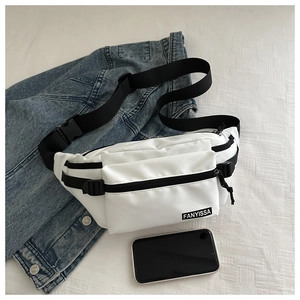 Detailed view of white minimalist nylon chest bag with black adjustable strap and buckle