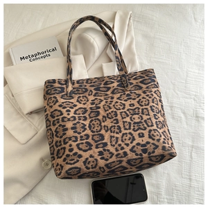 Top view of large leopard print tote bag with soft inner space for books and smartphone