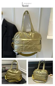 Detailed view of the gold quilted tote bag with metallic finish and padded texture
