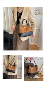 Three-way style showing handbag as tote, shoulder and crossbody with chain strap details