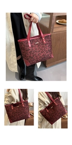 Detail of leopard print tote bag featuring burgundy leather trim and gold metal accents