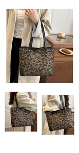 Detail of leopard print tote bag with black leather straps and gold metal hardware studs