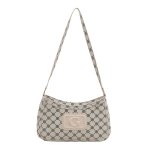 French style cream square underarm bag with black clover patterns and G buckle