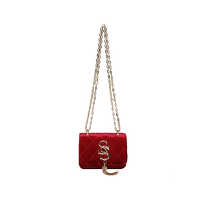 Sac bandoulière en velours rouge matelassé avec logo SS doré et détail de gland
