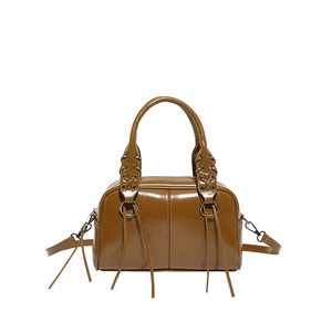 Brown faux leather Boston bag with woven handles and adjustable shoulder strap