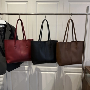 Three retro faux leather tote bags in burgundy, black and brown for daily commute