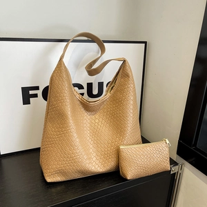 Earth tone large woven tote bag with matching zipper pouch in minimalist retro style