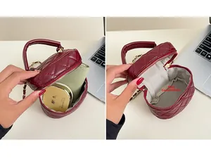 Detail view of burgundy quilted mini bag showing the main pocket storage and internal lining