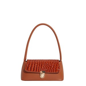 Brown baguette shoulder bag with crocodile texture stitching and gold metal buckle lock