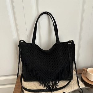 Retro black fringe tote bag with hollow woven design and leopard print details