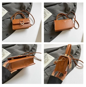 Detail view of brown PU leather crossbody bag with gold D-ring buckle and adjustable strap