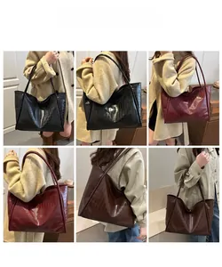 Three colors of faux crocodile tote bags shown on a model from multiple angles