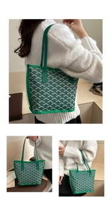 Close-up of the green tote bag with white Y-shaped geometric texture and leather straps