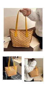 Close-up of yellow tote bag with Y-shaped jacquard pattern and brown edge stitching