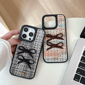 Premium tweed iPhone case featuring stylish 3D bows and a protective leather-like texture