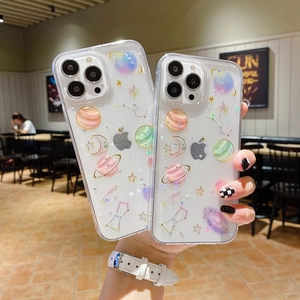 Detail of glittery starry sky phone case for iPhone featuring planets and moon designs